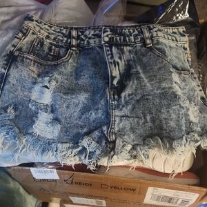 Women's Light Blue Distressed Denim Shorts with Frayed Hem